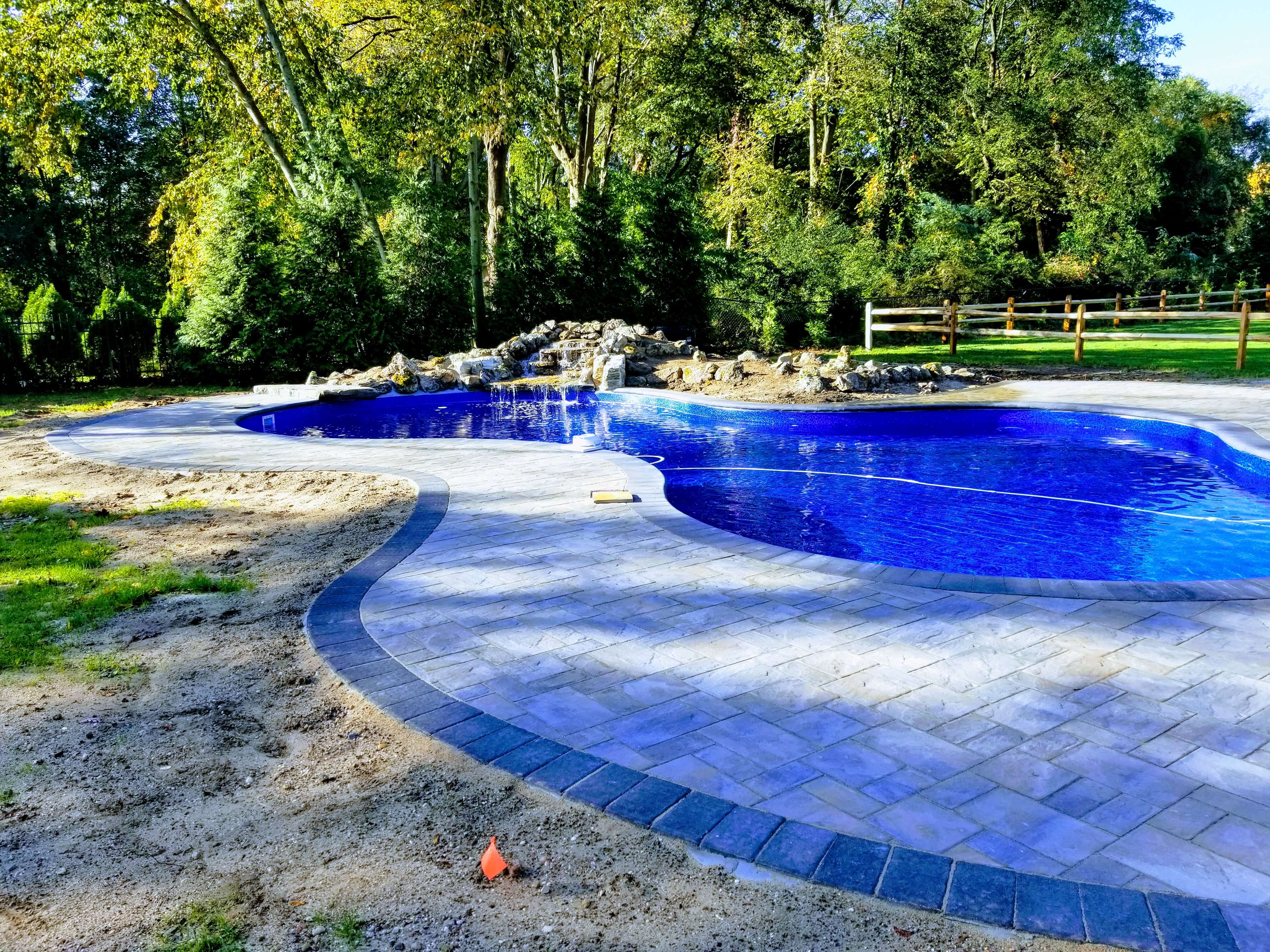 Luxury pond and waterfall installation